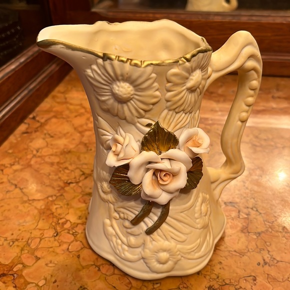 Ceramic pitcher with flowers